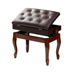 Brown tufted bench with wooden legs on a white background