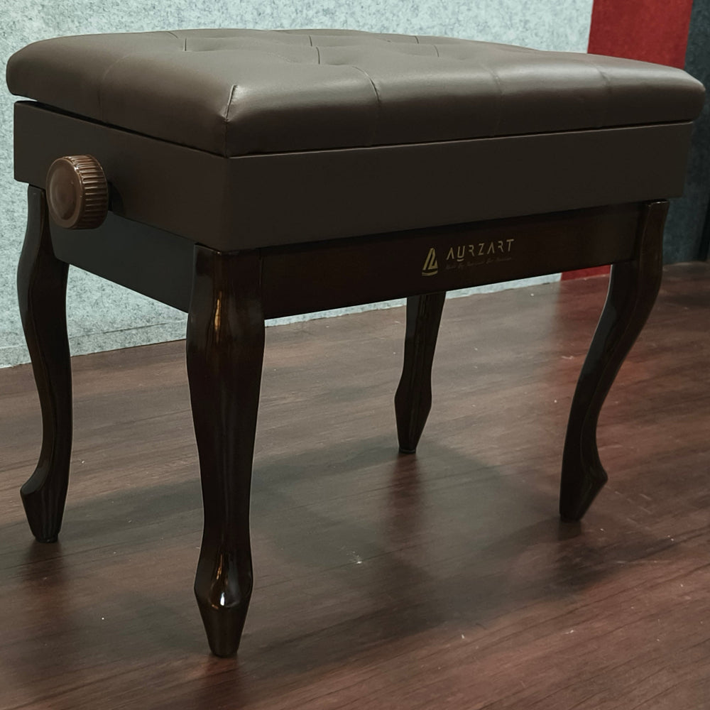 Brown piano bench on a wooden floor with a textured wall in the background